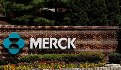 The Merck logo is seen at a gate to the Merck & Co campus